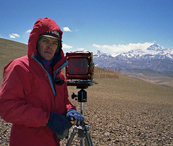 Joseph Blackburn, professional photographer makes a photograph of Mt Everest from PangLa Pass, Tibet.